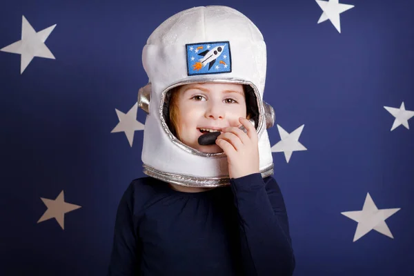 stock image Close-up little smiling girl dressed as astronaut