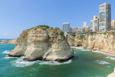 Raouche, Pigeon's rock and cave, a touristic icon rock cliff in Beirut, Lebanon. clipart