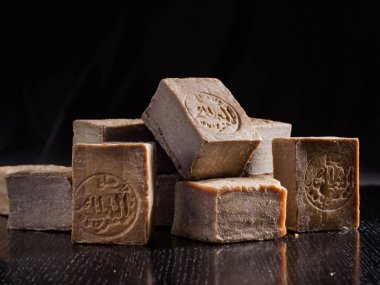 A pile of dried Aleppo soaps, handmade in Syria from traditional methods, with 