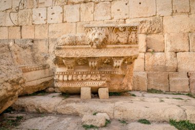 Carved decors and Roman architecture in limestone in the ancient temple of Bacchus, Jupiter-Baal heritage site, Baalbek, Beqaa Valley, Lebanon clipart