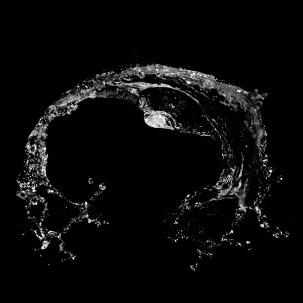 Water splashing isolated over a black background. — Stock Photo, Image