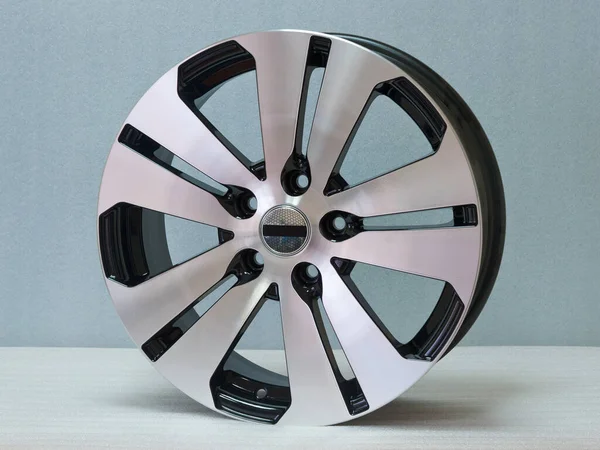 Aluminum wheel rim on a light background.