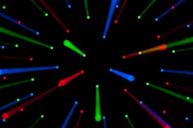 Doku - siyah arkaplanda uçan renk lekeleri.