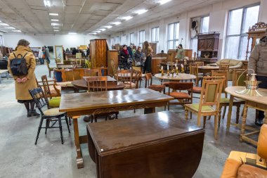 Vintage furniture, dishes and other at the fair or the flea market in Minsk, Belarus clipart