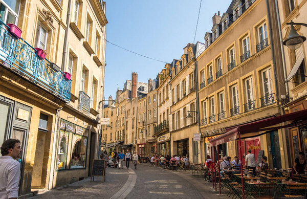 Metz, France - August 31, 2019: Pedestrian shopping street with luxury fashion stores in downtown of Metz, Lorraine, France