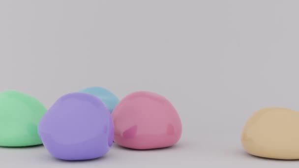 弾力のあるボールが落ちる モーフィング球の動き ソフトボディ物理3Dレンダリング 弾性形状の陽気なアニメーションがバウンスします 灰色の背景に落ちるカラフルな流体オブジェクト — ストック動画