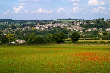 An idyllic midsummer Cotswolds countryside view of Painswick, Gloucestershire, England, UK clipart