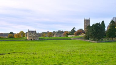 Historic Chipping Campden architecture viewed across the fields, Gloucestershire, Cotswolds, UK clipart