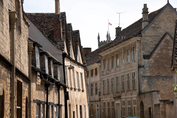 Quaint and historic buildings line the streets in the older parts of Cirencester, Gloucestershire, UK