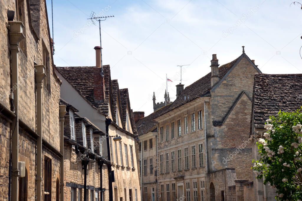 Quaint and historic buildings line the streets in the older parts of Cirencester, Gloucestershire, UK