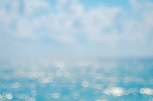 Praia de Blur com luz do sol bokeh fundo abstrato . — Fotografia de Stock