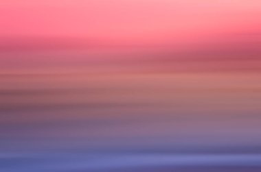 Hareket bulanıklığı bokeh güneş ışık dalga arka plan ile tropikal günbatımı plaj.