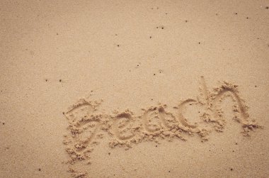 Alan üzerinde kum plaj Beach kelimelerin kopyalayın. Seyahat kavramı. 