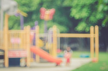Oyun alanında park arka plan bulanıklık.