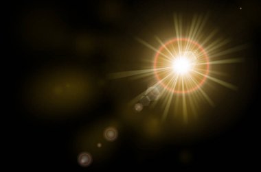 Güneş ışığı ve siyah arka plan üzerinde parlama.