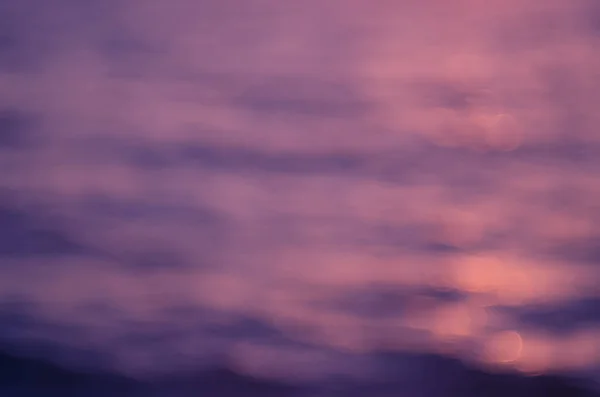 Blur playa atardecer tropical con bokeh sol luz onda fondo abstracto . — Foto de Stock