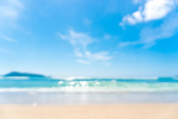 Verschwimmen tropischen Strand mit Bokeh Sonne Licht Welle abstrakten Hintergrund. — Stockfoto