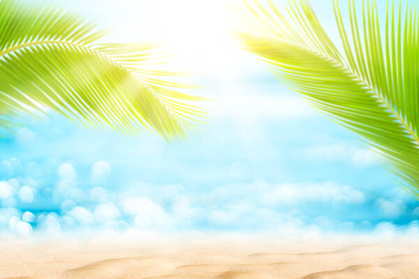 Blur beautiful nature green palm leaf on tropical beach with bokeh sun light wave abstract background. Copy space of summer vacation and business travel concept. Vintage tone filter effect color style