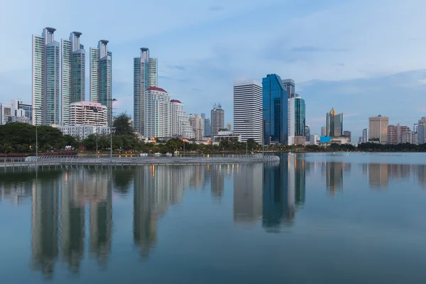 stock image Twilight, city office building with water reflection, Bangkok Thailand