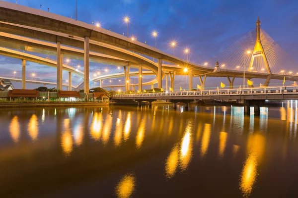 Twilight Suspension Bridge connect to highway overpass — Stock Photo, Image