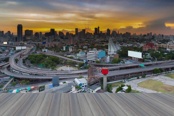 Opening wooden floor, highway interchanged with city office building