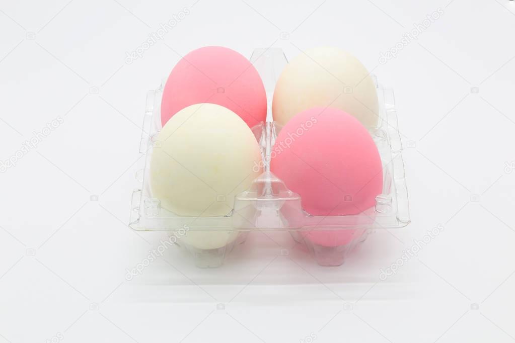 Salted eggs with white and pink colour