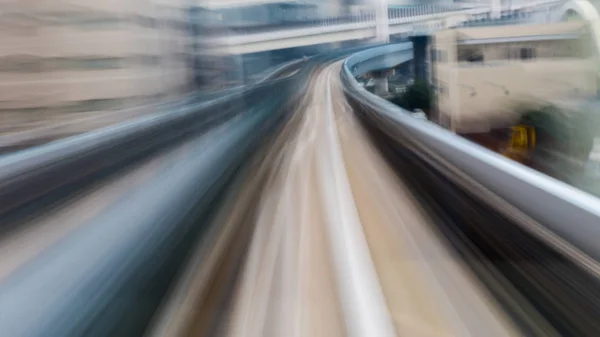 Tren de movimiento borroso en movimiento —  Fotos de Stock