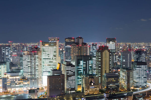 Night lights Osaka city business downtown view from Umeda Sky Building, Japan