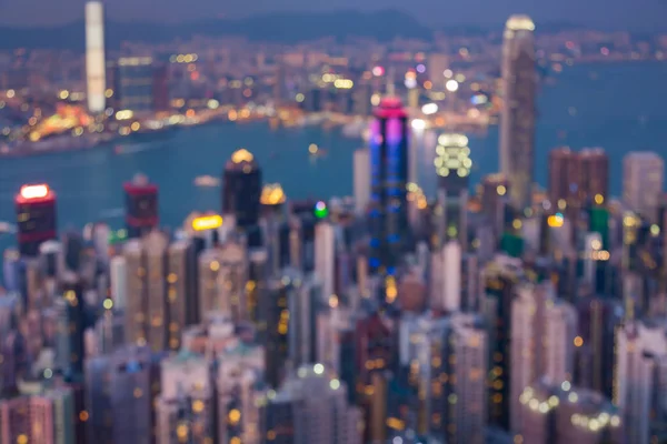 Havadan görünümü bokeh ışıklar Hong Kong şehir ofis binası bulanık — Stok fotoğraf