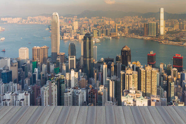 Opening wooden floor, Hong Kong city office building aerial view over Victoria Bay