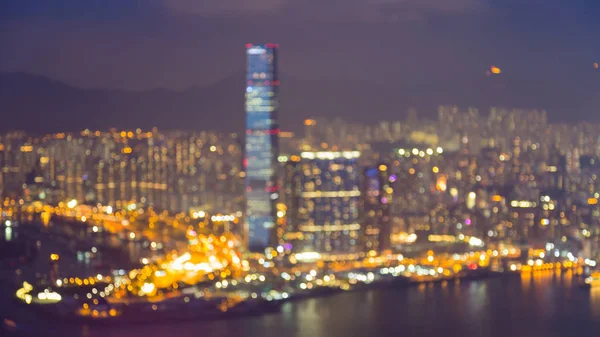 Αεροφωτογραφία θολή bokeh Χονγκ Κονγκ πόλη στο κέντρο του φωτός — Φωτογραφία Αρχείου