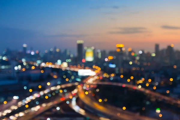 Abstract blurred bokeh lights city and road intersection — Stock Photo, Image