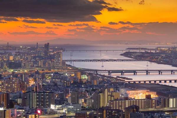 Osaka cidade área de negócios central com belo pôr do sol fundo — Fotografia de Stock