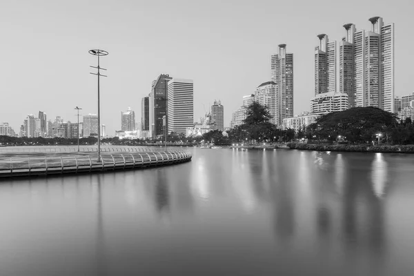 Bangkok city business building with reflection in water lake — Stock Photo, Image