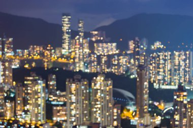 Gece yüksek tepede bina bokeh ışıklar Hong Kong ikamet bulanık