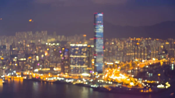 Noche borrosa luz bokeh Hong Kong vista aérea de la ciudad —  Fotos de Stock