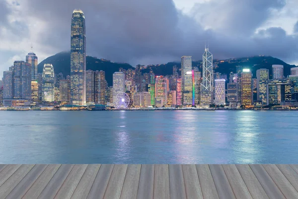 Hong kong office building at twilight sea front, cityscape background