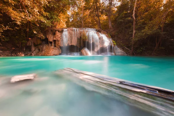 Sun beam over deep forest natural waterfall — Stock Photo, Image