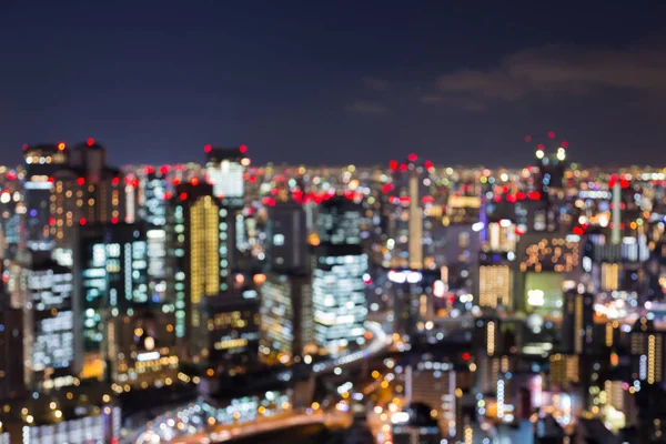 夜ぼやけてピンぼけ光大阪市中央ビジネス ダウンタウン — ストック写真