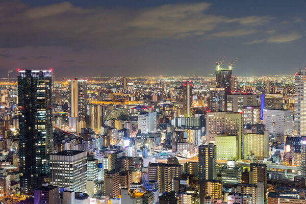 Night lights, Osaka central business downtown aerial view, Japan