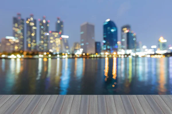 Twilight blurred bokeh office building with reflection, abstract background — Stock Photo, Image