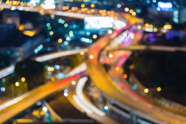 Översta motorvägen korsningen suddig bokeh ljus natt vy — Stockfoto