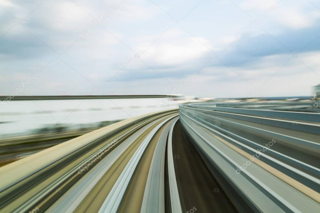 Monorail train track moving blurred motion