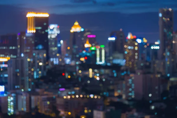 Nacht wazig bokeh stad lichte kantoorgebouw — Stockfoto