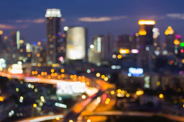 Vista aérea borrada bokeh luz escritório da cidade no centro da cidade — Fotografia de Stock