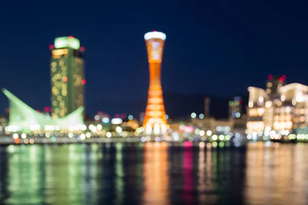 Visão noturna embaçada abstrata do crepúsculo, torre do porto de Kobe — Fotografia de Stock