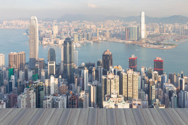 Opening wooden floor, Hong Kong city downtown view from the Peak mountain