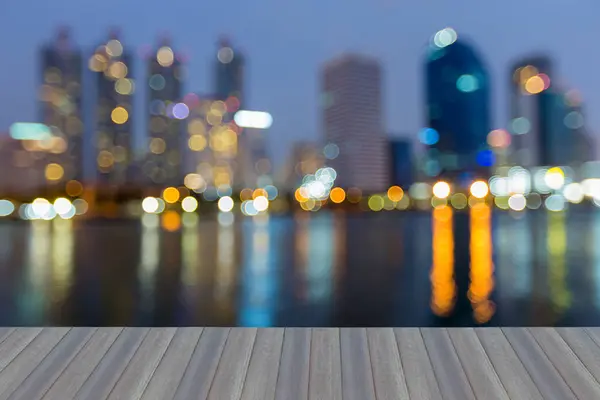 Blue twilight office building blurred bokeh light night view, abstract background — Stock Photo, Image