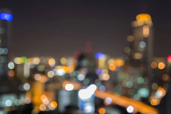 Noite borrada bokeh cidade centro da luz — Fotografia de Stock