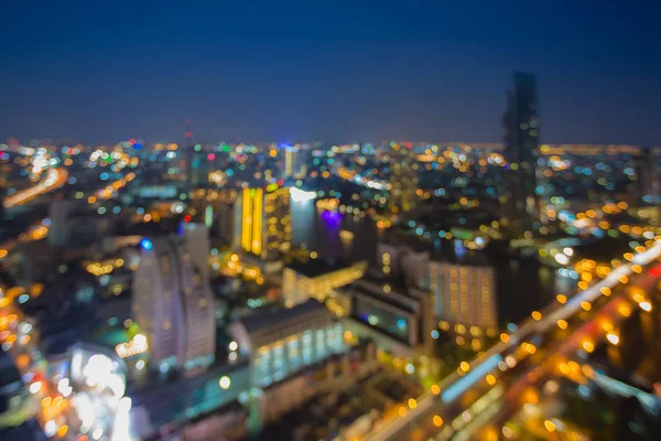 Pohled shora rozmazané bokeh město světla centrální obchodní centra — Stock fotografie